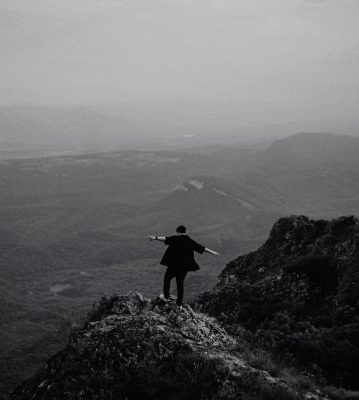 nature, mountains, landscape, black and white, cliff, solitude, adventure, silhouette, standing man, freedom, viewpoint, mist, ascent, hiking, natural beauty, reflection, lonely man, rocky, misthiker, dramatic horizon